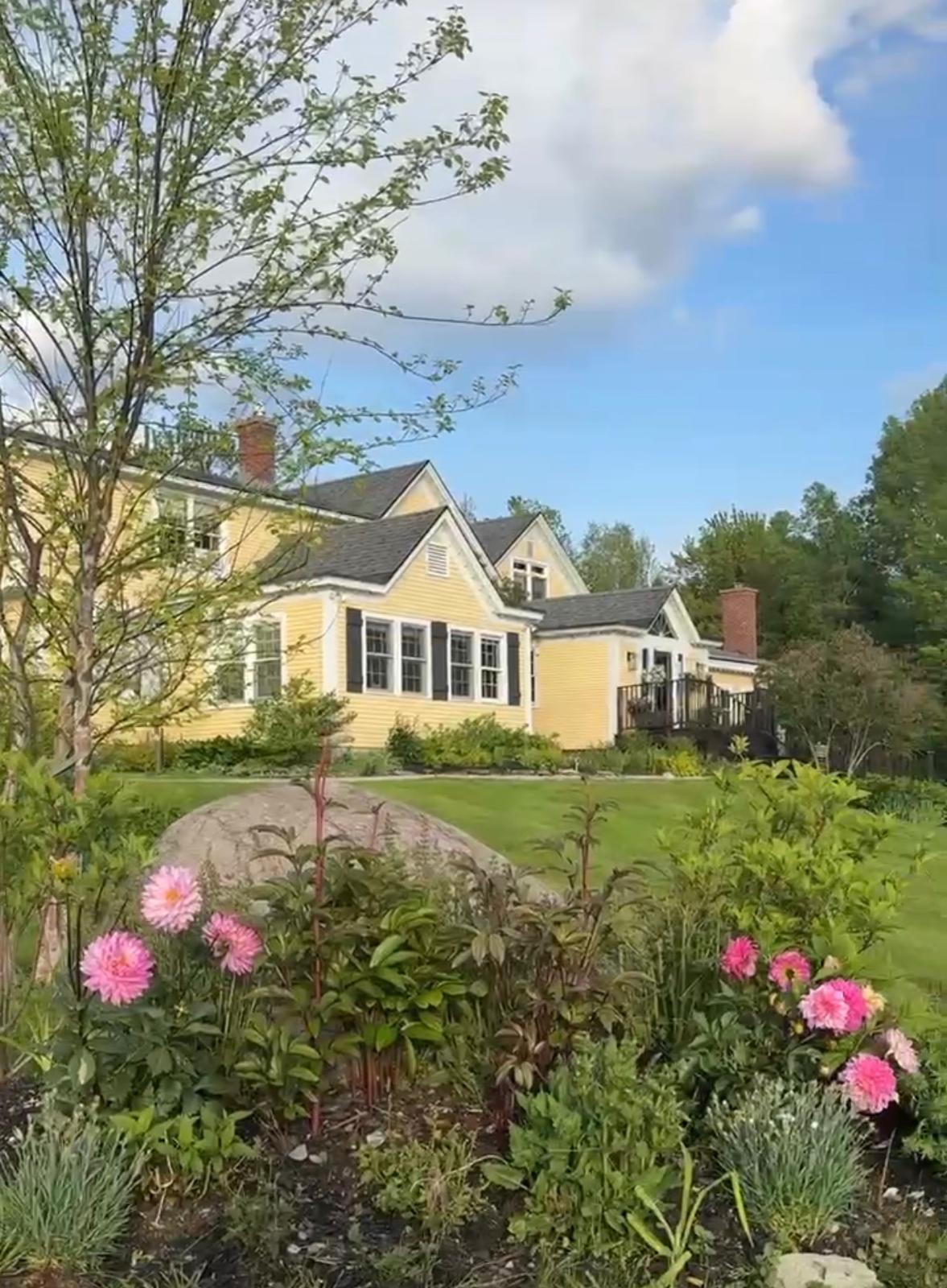Main House Exterior — garden and flower beds